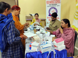 Staff members of Rich Harvest School attending ESI Medical Camp on Monday.