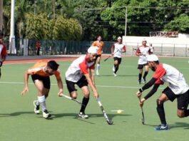 Players in action during a semi-final match of Hockey J&K UT Men Championship at KK Hakku Hockey Stadium, Jammu.