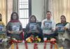 College management posing with newsletter during unveiling ceremony at GDC Neeli Nallah, Udhampur.