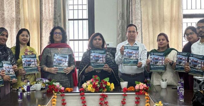 College management posing with newsletter during unveiling ceremony at GDC Neeli Nallah, Udhampur.
