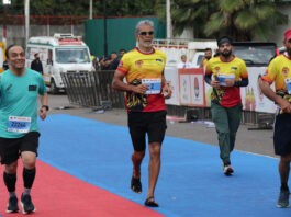 Ace runner and actor Milind Soman running during the Jammu Marathon on Sunday.