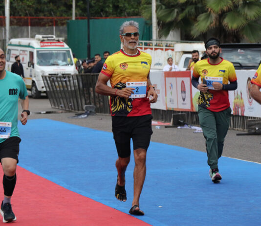 Ace runner and actor Milind Soman running during the Jammu Marathon on Sunday.