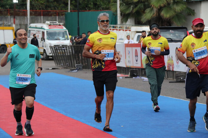 Ace runner and actor Milind Soman running during the Jammu Marathon on Sunday.