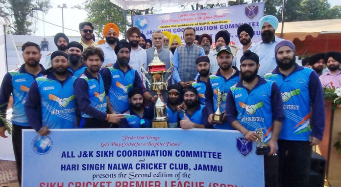 Winning tem posing along with dignitaries.