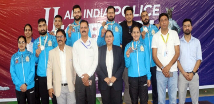 Medal winners posing along with dignitaries. Medal winners posing along with dignitaries.