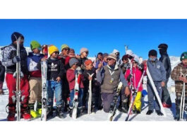 Snow Skiers posing for a group photograph. -Excelsior/Basharat Ladakhi