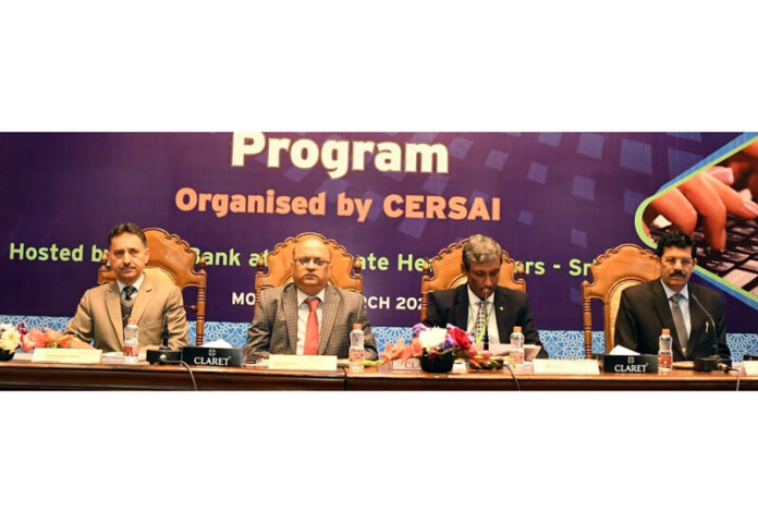 Dignitaries from J&K Bank on the dais during an awareness prorgramme in Srinagar on Monday.