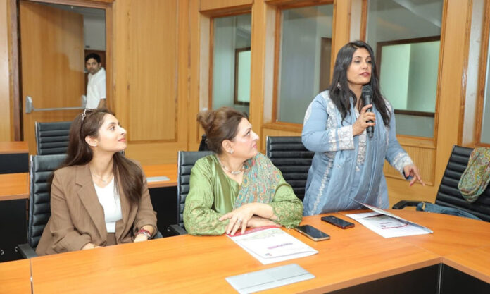 Women participating in dialouge.