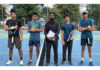 Tennis players posing before start of match at MA Stadium Jammu.