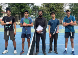 Tennis players posing before start of match at MA Stadium Jammu.