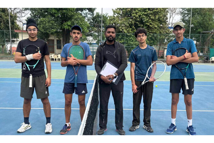 Tennis players posing before start of match at MA Stadium Jammu.
