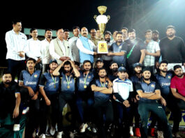 Winning team receiving trophy from MLA Akhnoor Mohan Lal Bhagat.