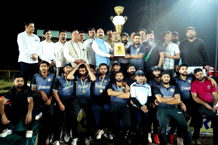 Winning team receiving trophy from MLA Akhnoor Mohan Lal Bhagat.