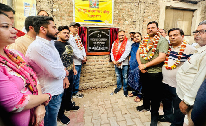 MLA Vikram Randhawa inaugurating development works in Jammu.