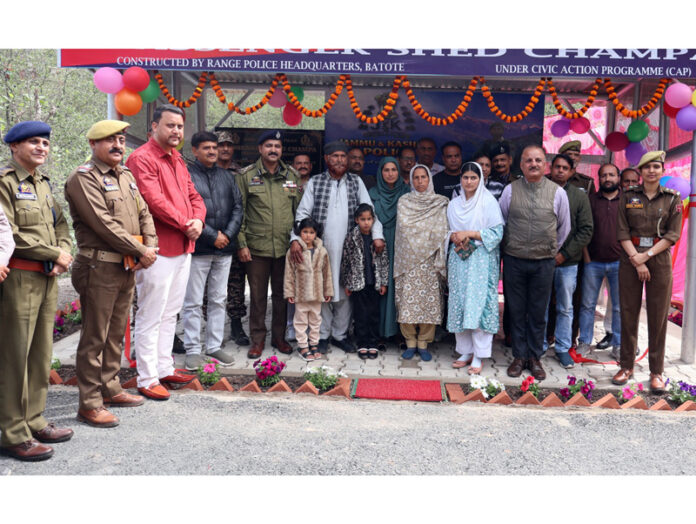 Police officers, locals and others after the inauguration of a passenger shed at Champa, Batote on Saturday.