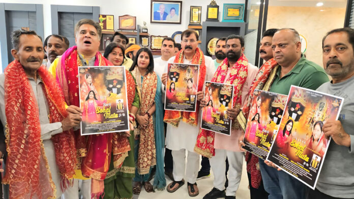 Ravinder Raina, former BJP state president along with others releasing a devotional track in Jammu. Ravinder Raina, former BJP state president along with others releasing a devotional track in Jammu.