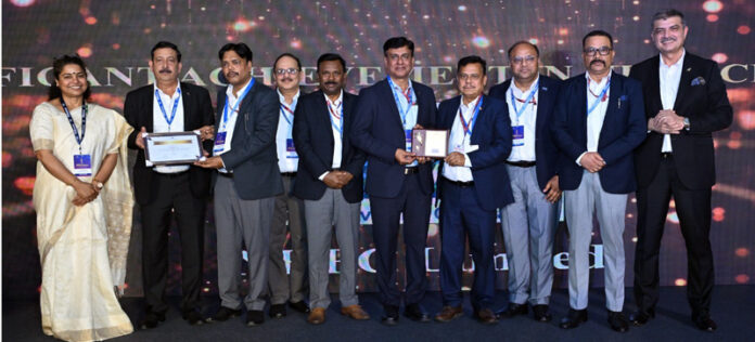 Officials of NHPC receiving an award during a function on Friday.