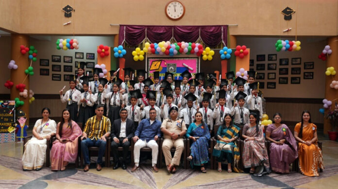 Dignitaries posing along with students during a programme.Dignitaries posing along with students during a programme. Dignitaries posing along with students during a programme.
