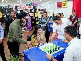 MLA Nagrota Devyani Rana making the first move at International Rating Chess Fiesta.