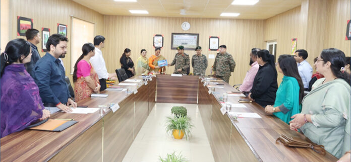 Brig Kumar Anand, Commander of Chenab Brigade unveiling school magazine in presence of school management.