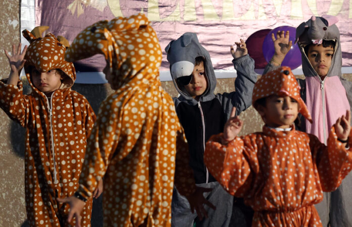 Students performing during an Annual Day event.