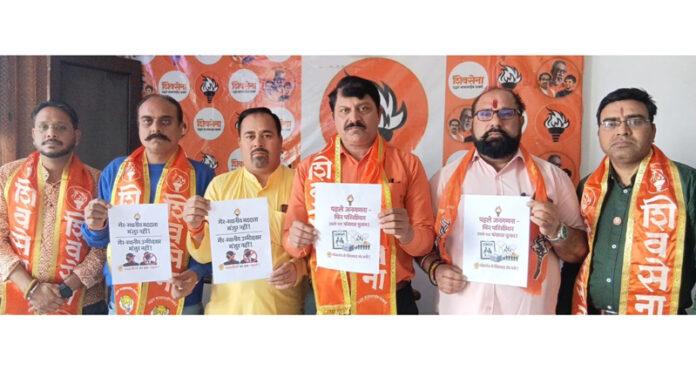 Shiv Sena J&K president, Manish Sahni and others displaying some paper in Jammu on Tuesday. Shiv Sena J&K president, Manish Sahni and others displaying some paper in Jammu on Tuesday.