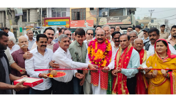 MLA Mohan Lal Bhagat inaugurating the macadamization work of the link road in Akhnoor.