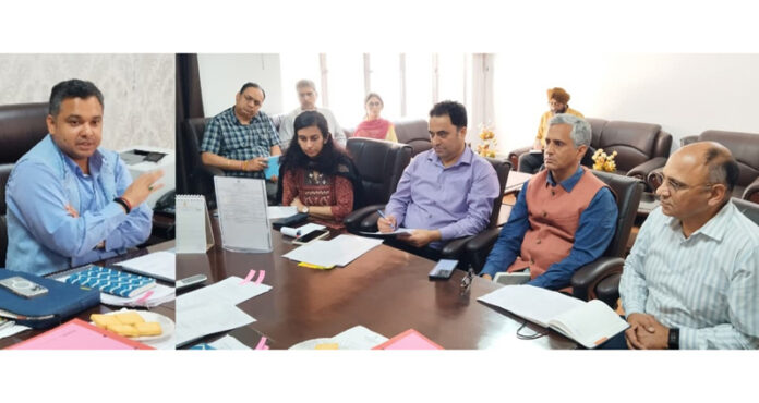Secretary Information Technology Department Dr Piyush Singla chairing a meeting on Tuesday.