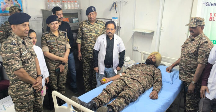 A CRPF Jawan donating blood during a camp organized in Udhampur. A CRPF Jawan donating blood during a camp organized in Udhampur.