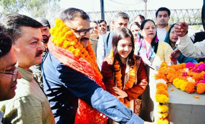Minister Javed Rana inaugurating water release into Ranbir canal on Monday.