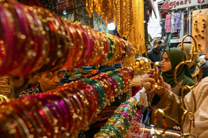 Trending 'Kashmiri Choodiyan' on display at a Srinagar market on Friday. -Excelsior/Shakeel