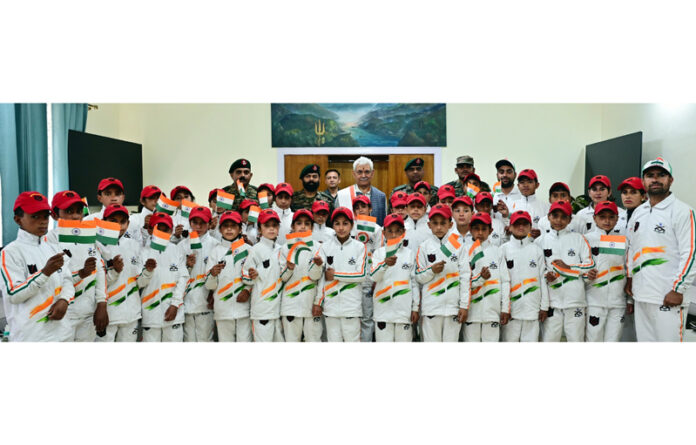 LG Manoj Sinha posing with the students from Army Goodwill School, Saujiyan at Lok Bhawan.