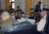 DGP Nalin Prabhat interacting with police officers during a meeting in Pulwama on Saturday.