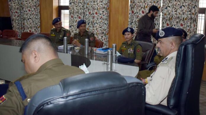 DGP Nalin Prabhat interacting with police officers during a meeting in Pulwama on Saturday.