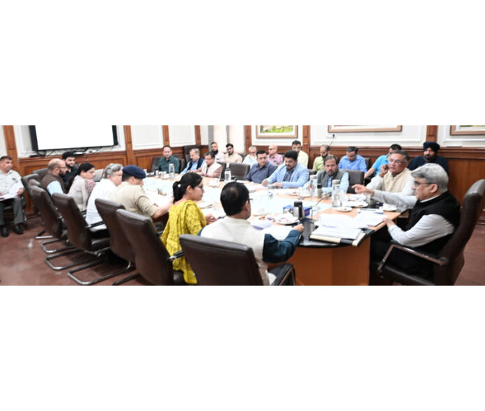 Chief Secy Atal Dulloo chairing a meeting on Wednesday.