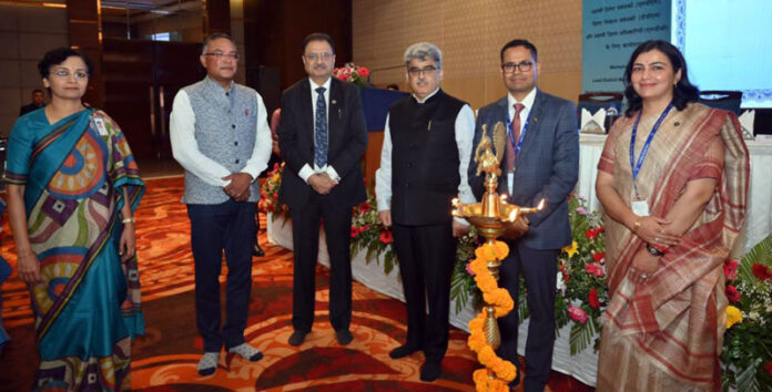 Chief Secretary, Atal Dulloo posing along with others during a function in Jammu.