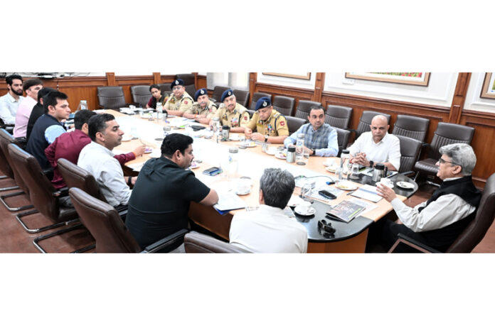 Chief Secretary chairing a meeting at Jammu on Friday.
