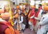 Holy mace being received with rituals at Shri Laxmi Narayan Mandir for proceeding towards Purmandal.