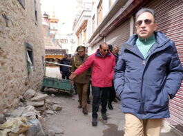 LG Ladakh VK Saxena passing through a narrow lane during his inspection visit to Leh old town.