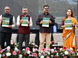 Forest Minister and officers during a function at Jammu on Tuesday.