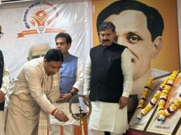 MP Sat Sharma lighting the ceremonial lamp during a function in Jammu.