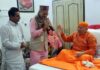 Governor Kavinder Gupta meeting Swami Ram Swaroop Yogacharya at Kangra on Friday.