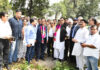 Minister Javed Rana inspecting desilting of canals on Saturday.
