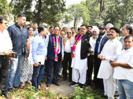 Minister Javed Rana inspecting desilting of canals on Saturday.