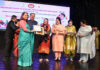 Minister Sakeena Itoo felicitating Commissioner Secretary Forest Sheetal Nanda on Saturday.