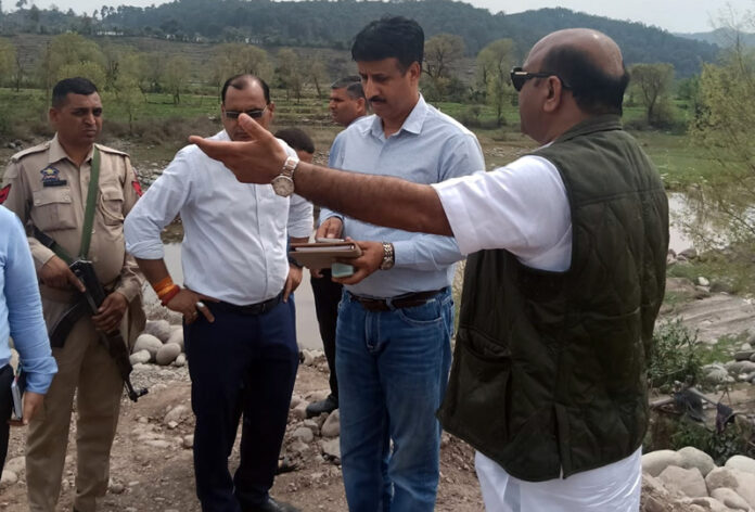 Deputy Chief Minister during visit to a stone crusher in Rajouri.