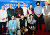 Minister Javed Rana posing for photograph with winners of J&K Viksit Bharat Youth Parliament on Wednesday.