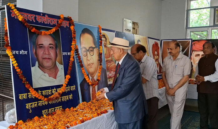 People paying floral tribute to Kanshi Ram during a function in Jammu.