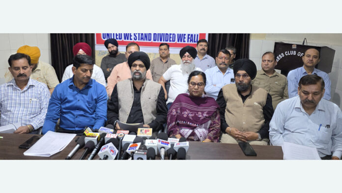 Members of the JAC, H&ME Department during a press conference at Press Club, Jammu.— Excelsior/Rakesh