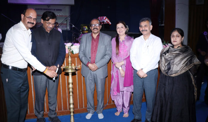 Dignitaries during lamp lighting ceremony on Foundation Day function of the Cluster University of Jammu.